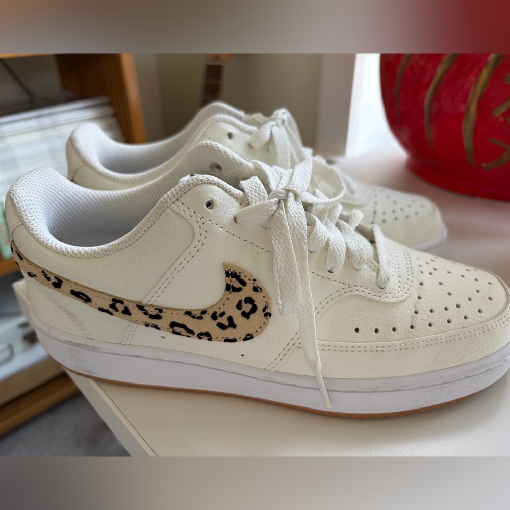 Nike White Low-Top Sneakers with Leopard Swoosh Accent
